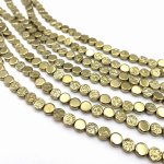 Hematyt moneta dwustronna złota 6 mm - sznur 