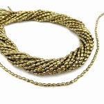 Hematyt złote oliwki fasetowane ryż 5x3 mm - sznur